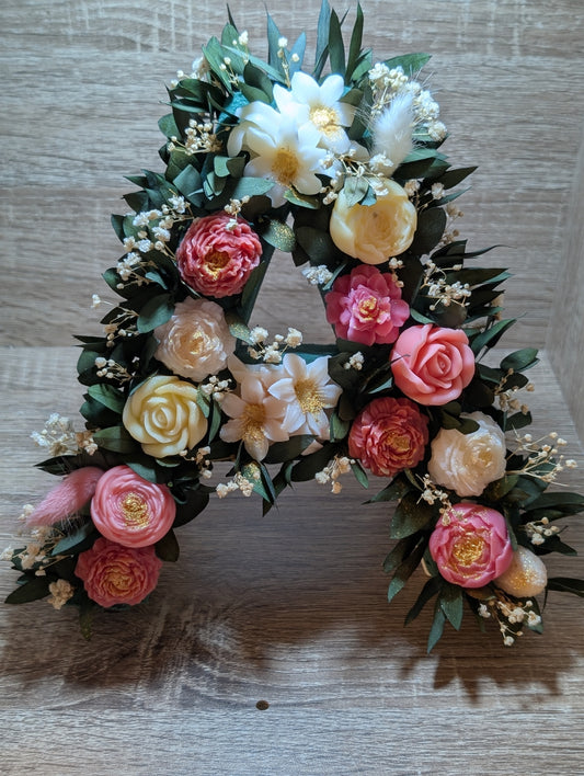 Lettre florale garnie de fondants parfumés